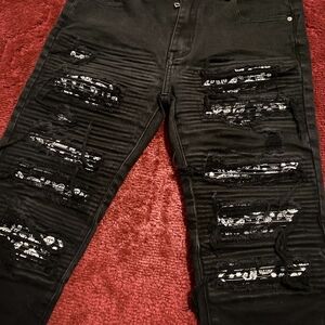 AMIRI Black Distressed Skinny Jeans
